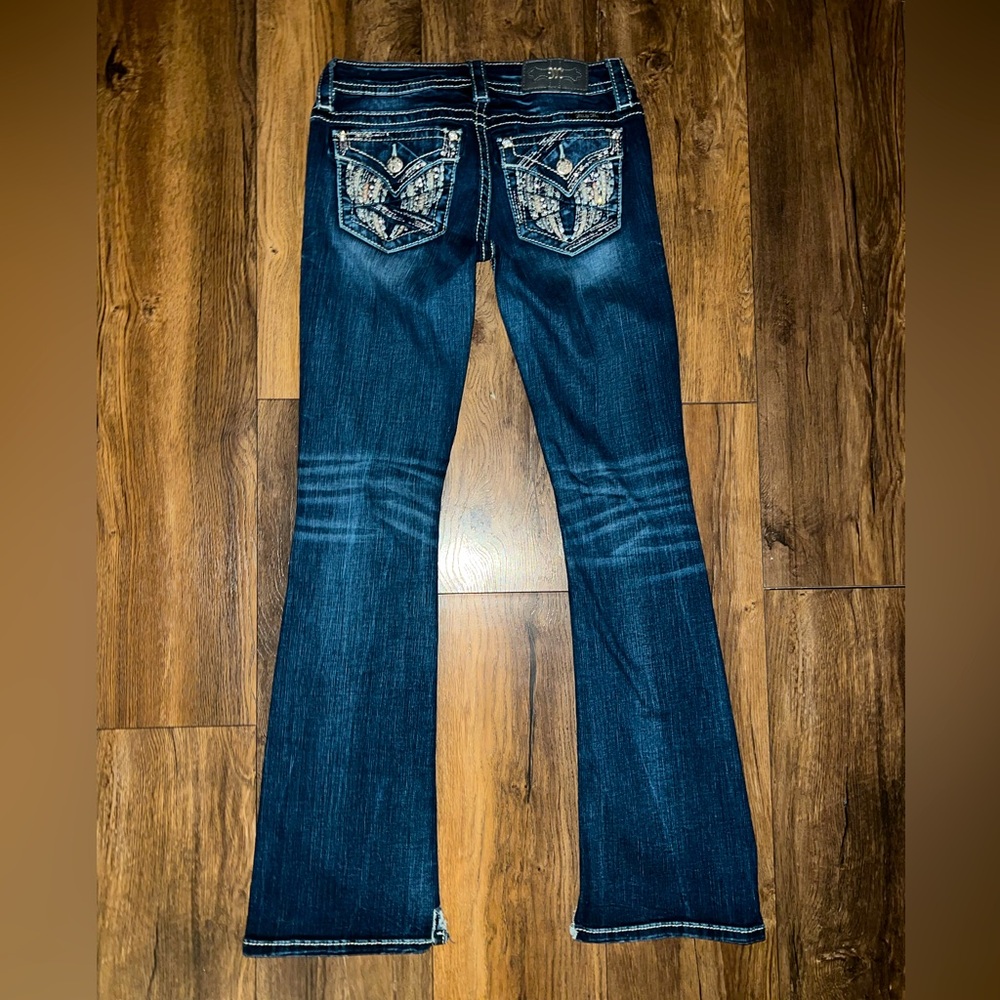 Women’s Miss Me Size 27 x 33 Bling Angel Wing Signature Boot Jeans.